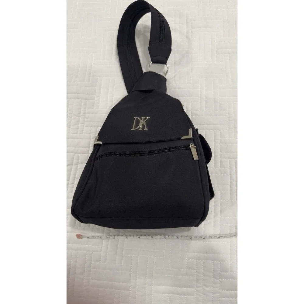 DKNY Donna Karan black‎ nylon sling crossbody backpack bag